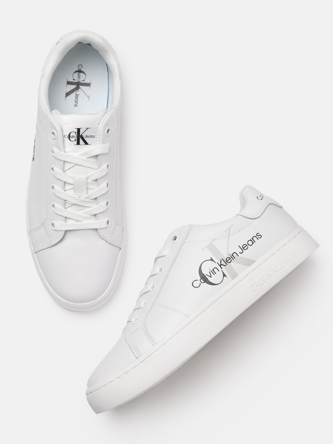 

Calvin Klein Men White Printed Leather Sneakers