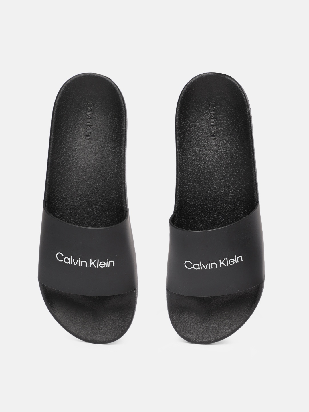 

Calvin Klein Men Black Solid Sliders