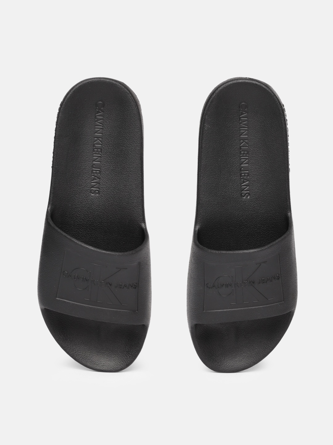 

Calvin Klein Men Black Solid Sliders