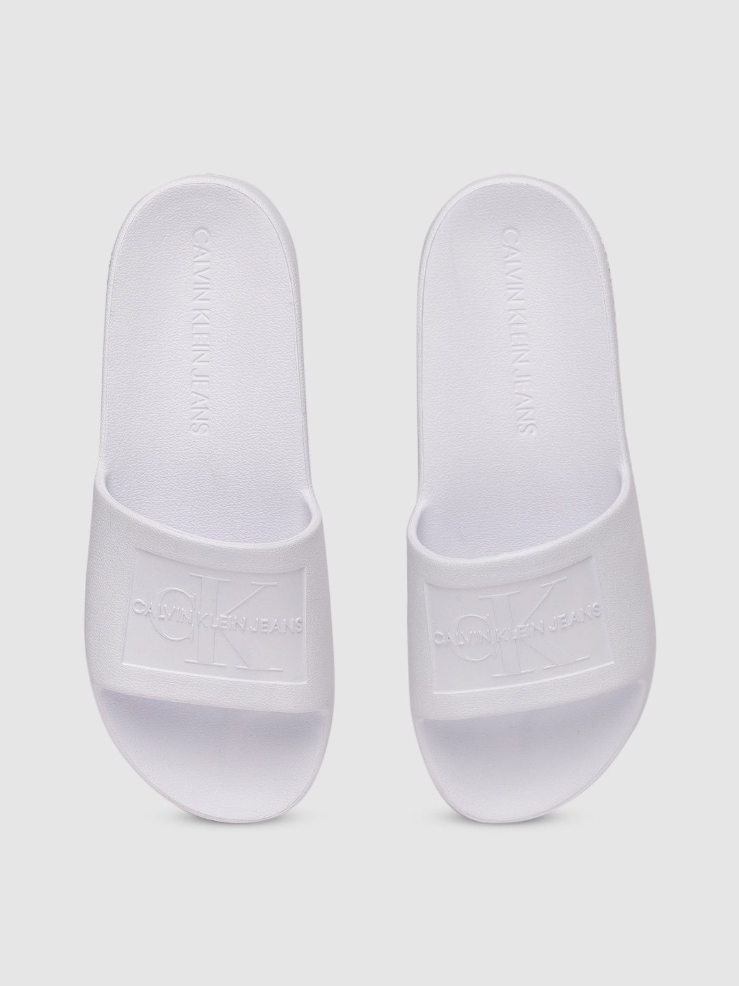 

Calvin Klein Men White Self-Design Debossed Sliders