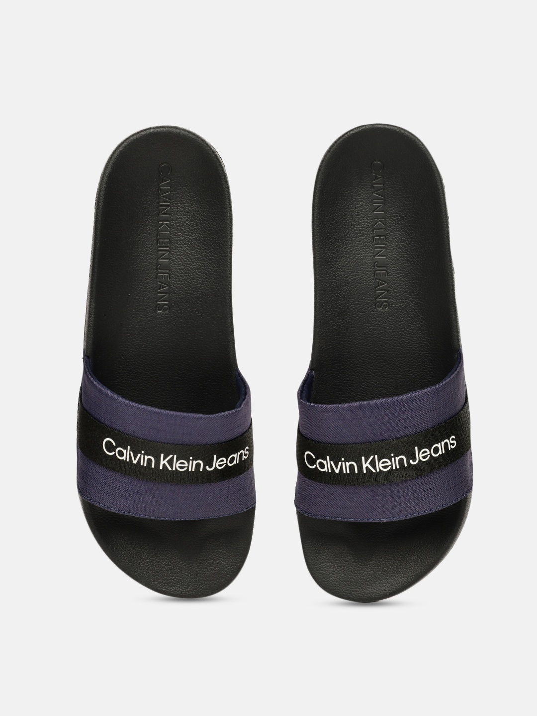 

Calvin Klein Men Blue & Black Printed Sliders