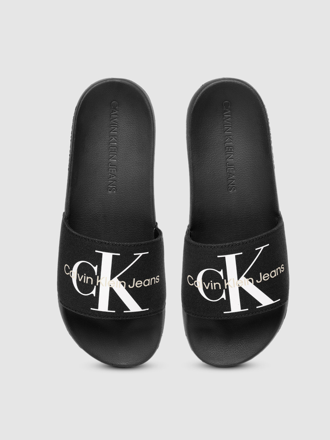 

Calvin Klein Men Black Fabric Printed Sliders