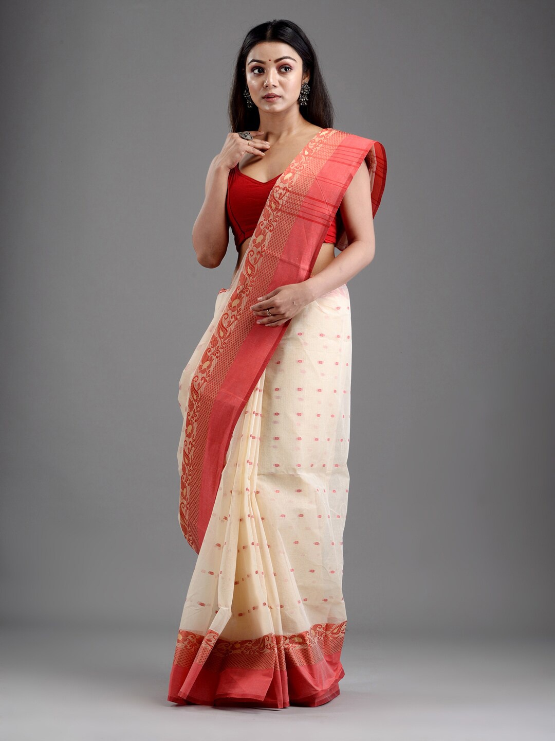 

Mitera Off White & Red Ethnic Motifs Pure Cotton Taant Saree