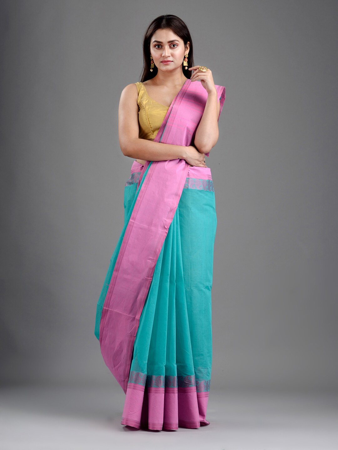 

Mitera Sea Green & Magenta Woven Design Pure Cotton Taant Saree