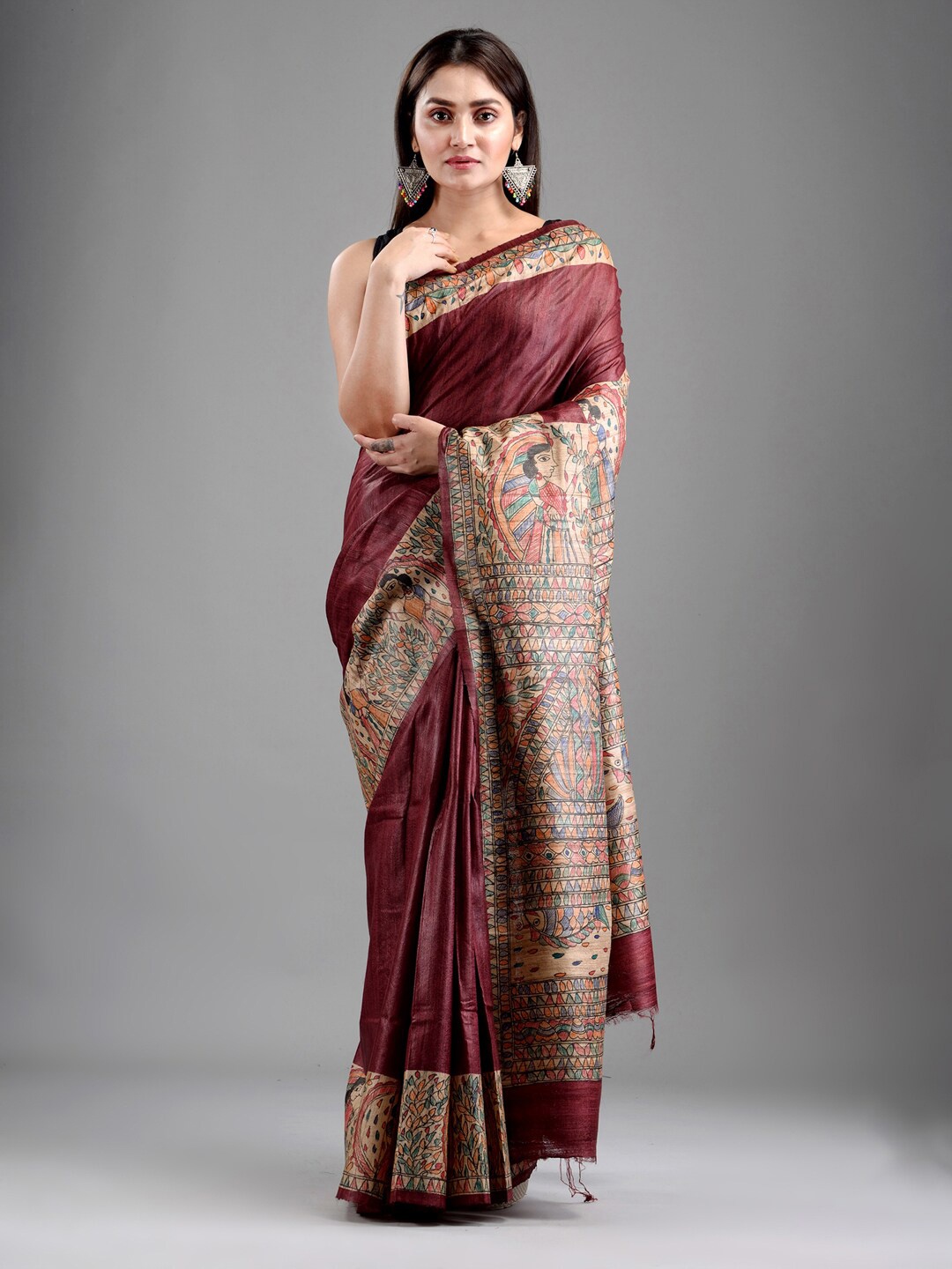

Mitera Burgundy & Beige Madhubani Handpainted Pure Silk Tussar Saree