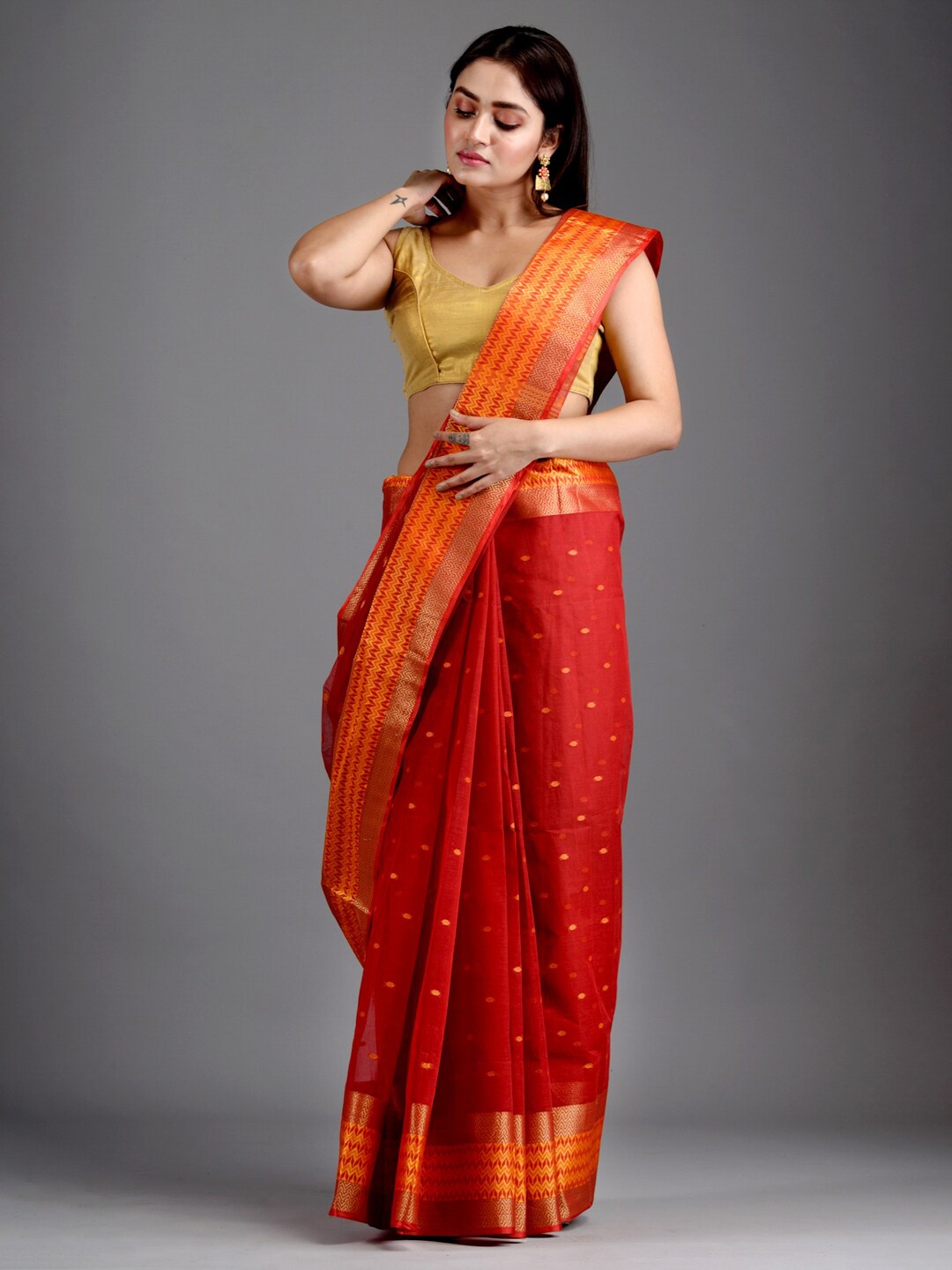 

Mitera Red & Orange Ethnic Motifs Zari Pure Cotton Taant Saree