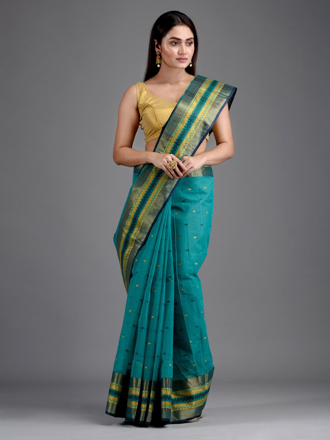 

Mitera Sea Green & Yellow Zari Pure Cotton Taant Handloom Saree