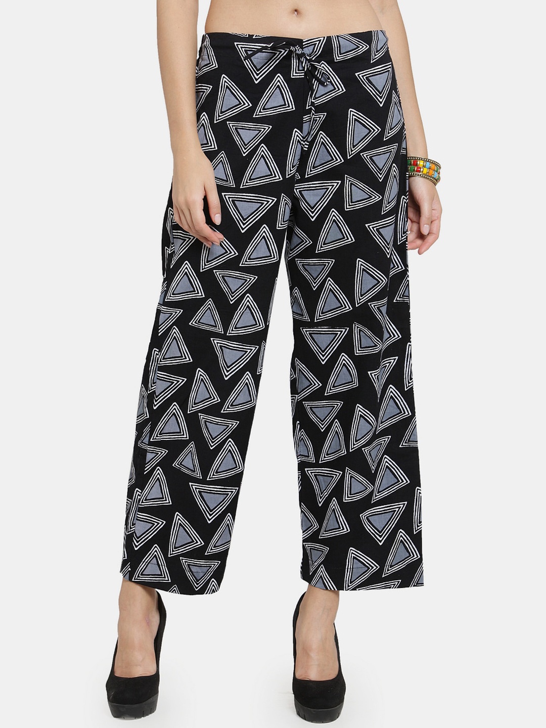 

Enchanted Drapes Women Black Printed Cotton Parallel Trousers