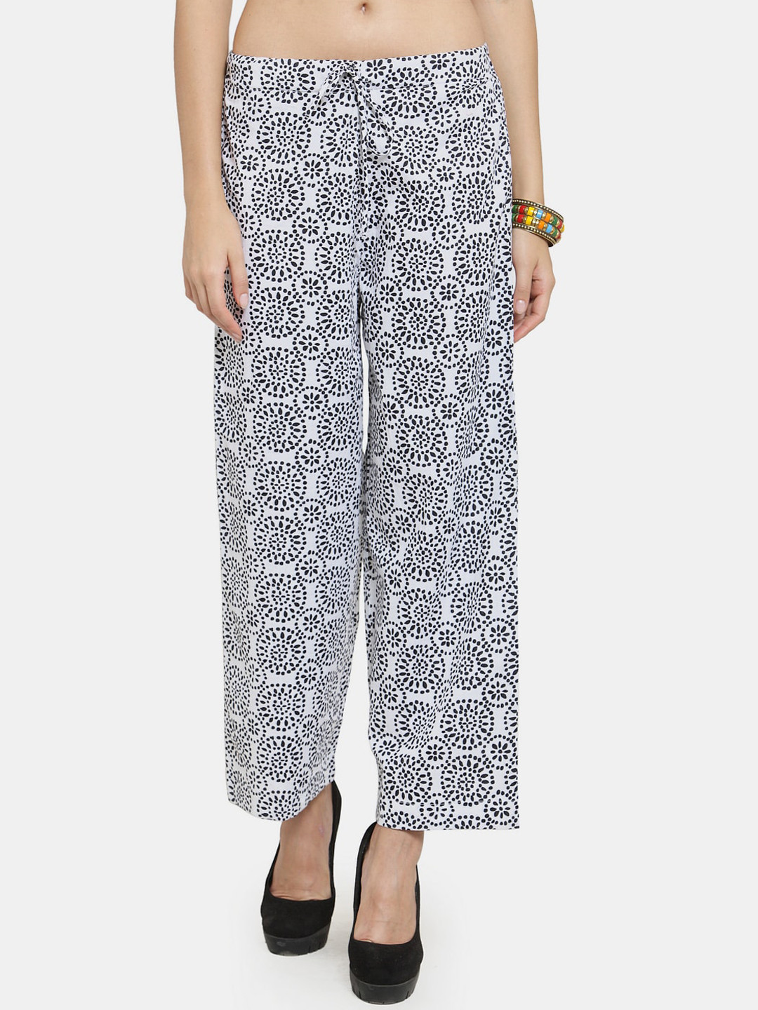 

Enchanted Drapes Women White Printed Trousers