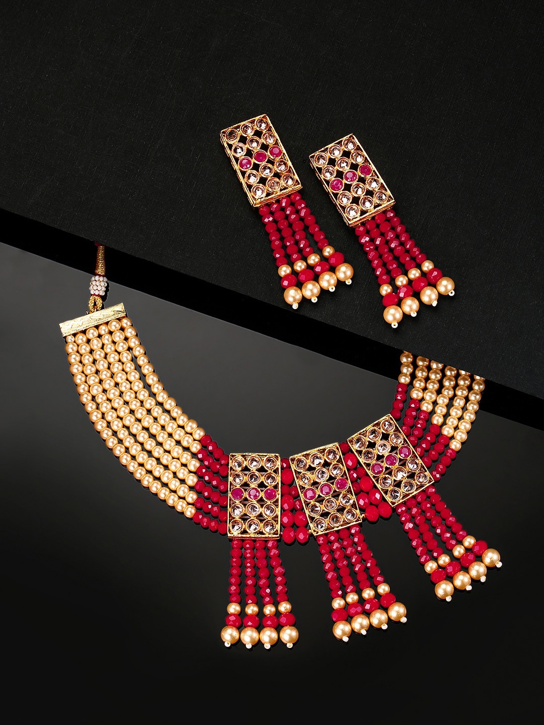 

Priyaasi Women Red Stone Studded & Beaded Jewelry Set