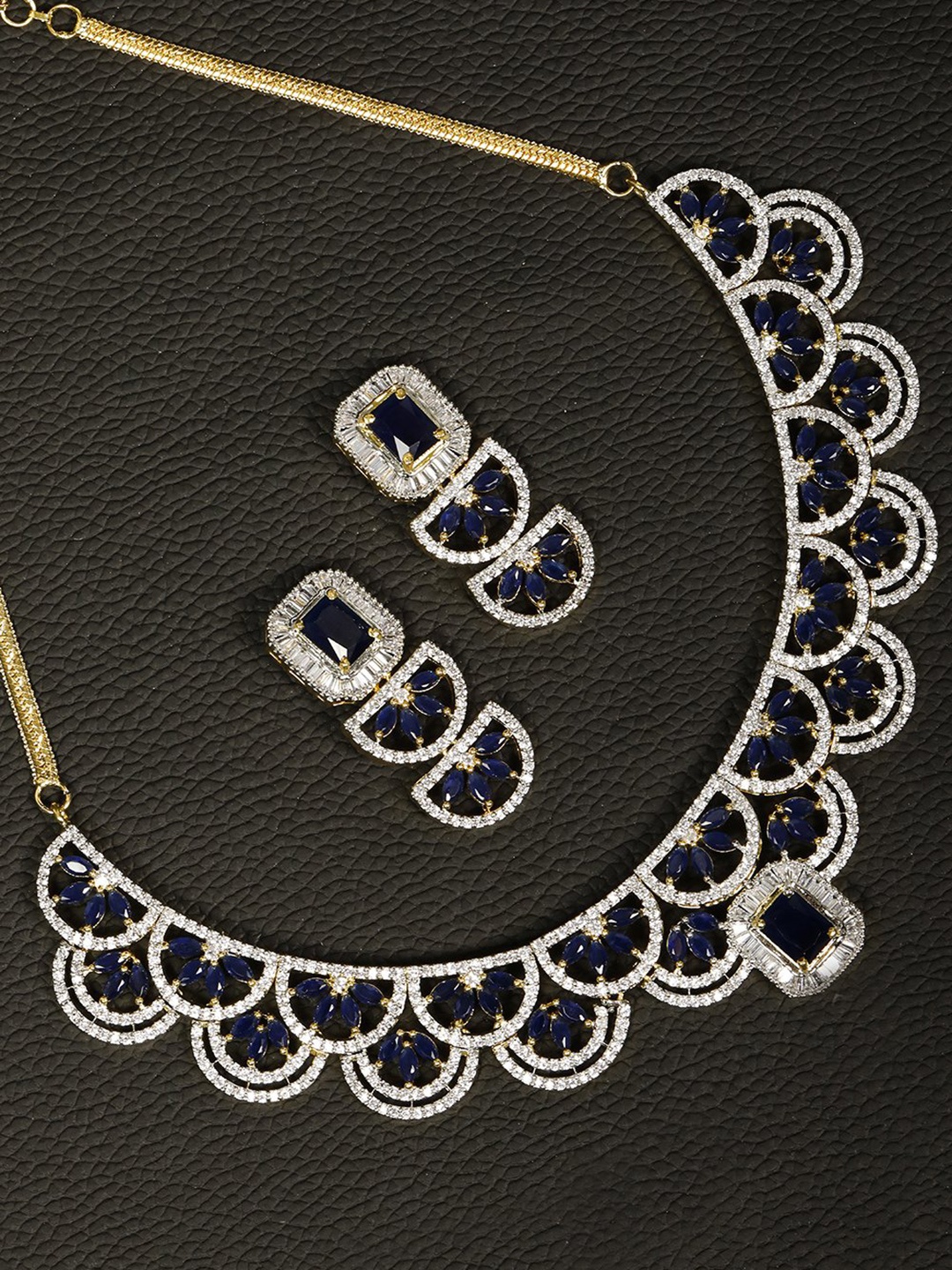 

Priyaasi Gold-Plated Blue & White AD-Studded Jewellery Set