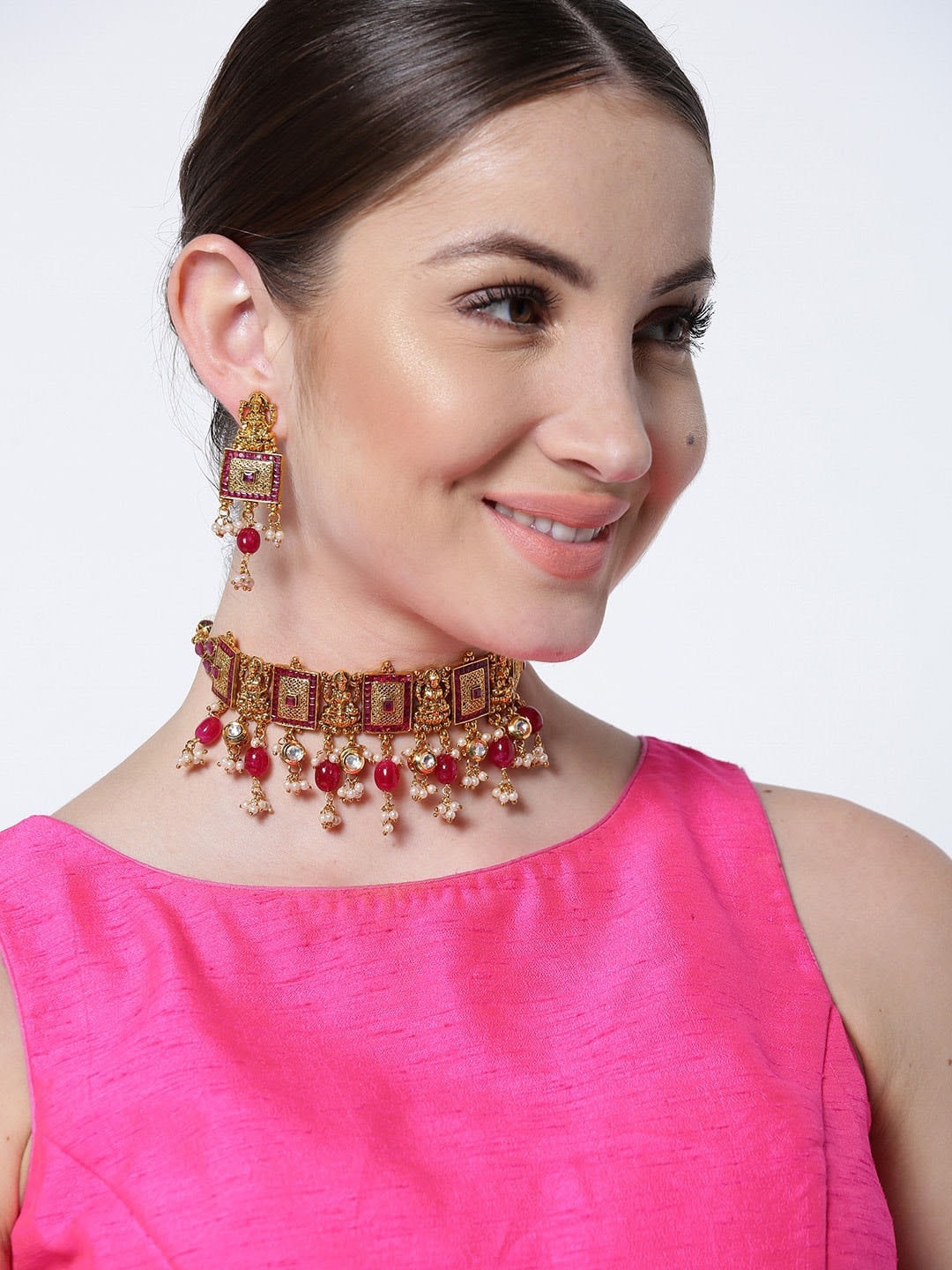 

Priyaasi Gold-Plated Red Stone-Studded Beaded Jewellery Set
