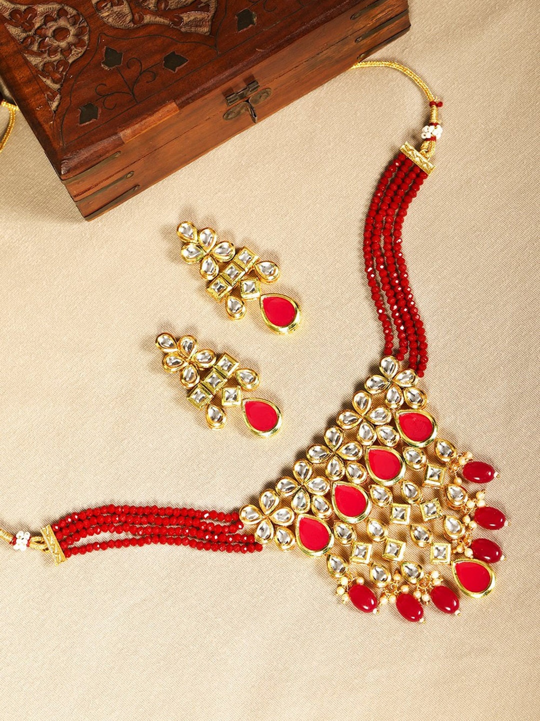 

Priyaasi Maroon Gold-Plated AD Studded Jewellery Set