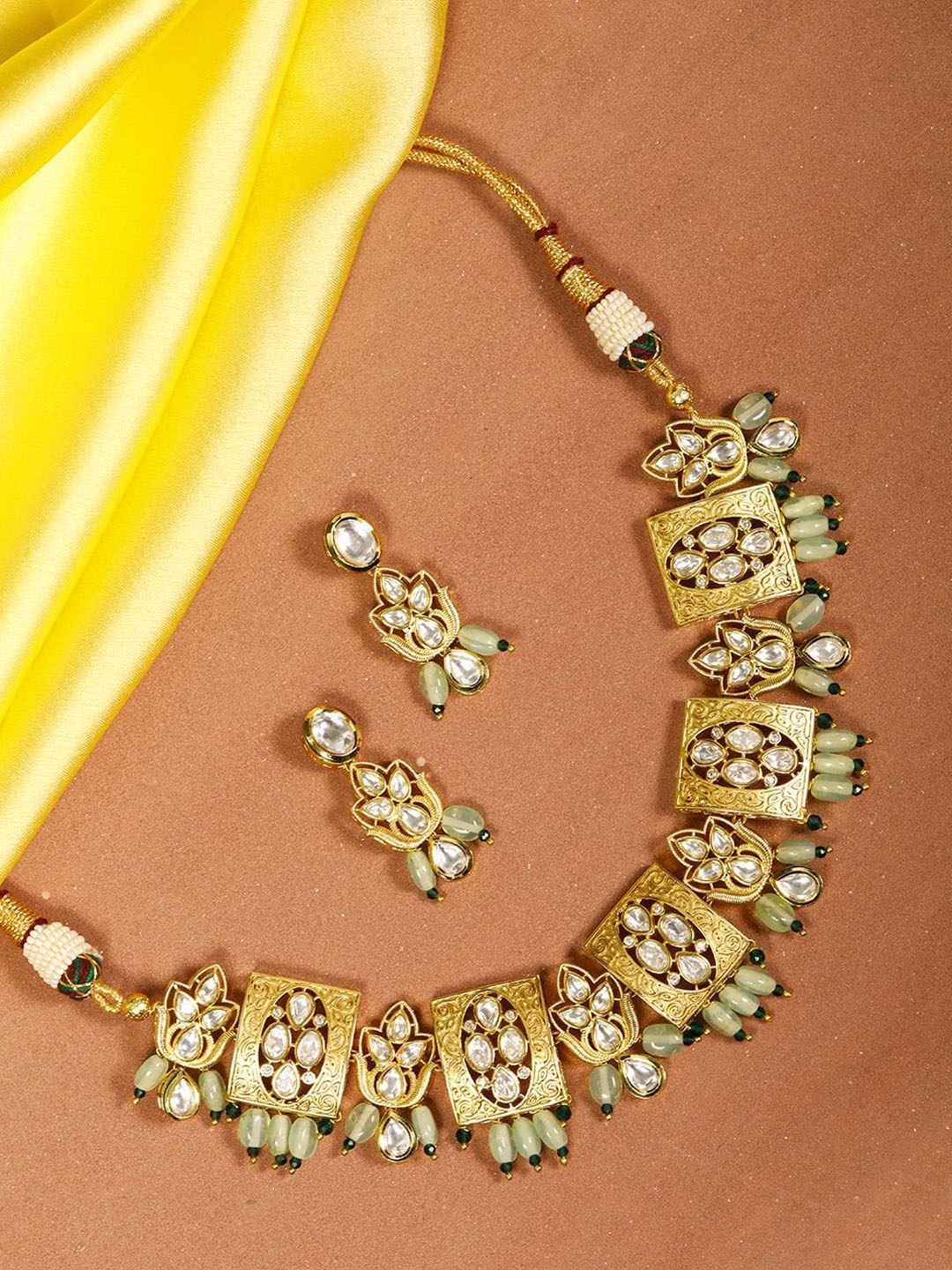 

Priyaasi Gold-Plated AD Studded Jewellery Set