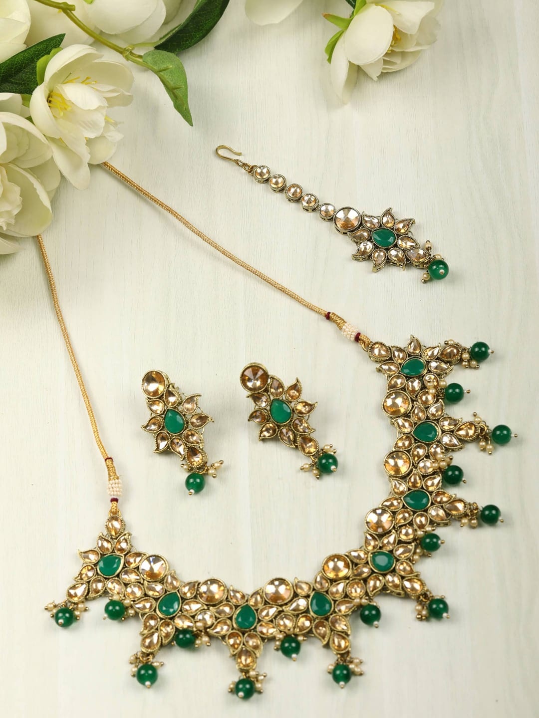 

Priyaasi Gold-Plated White & Green Kundan-Studded & Emerald Beaded Jewellery Set