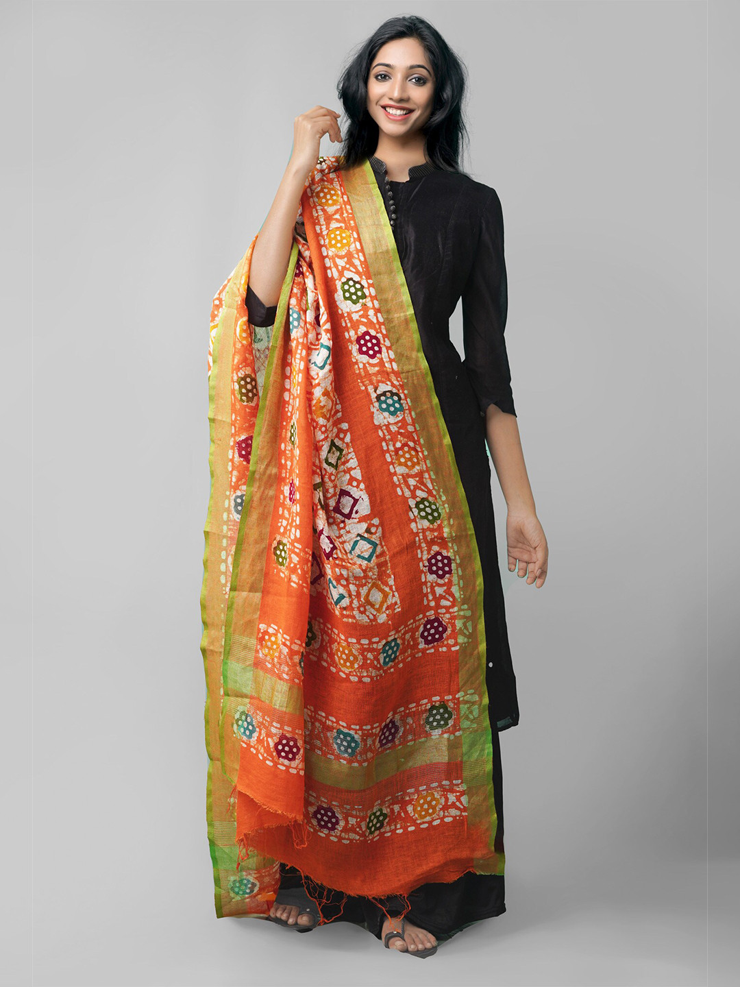 

Unnati Silks Orange & Green Ethnic Motifs Dyed Linen Batik Dupatta