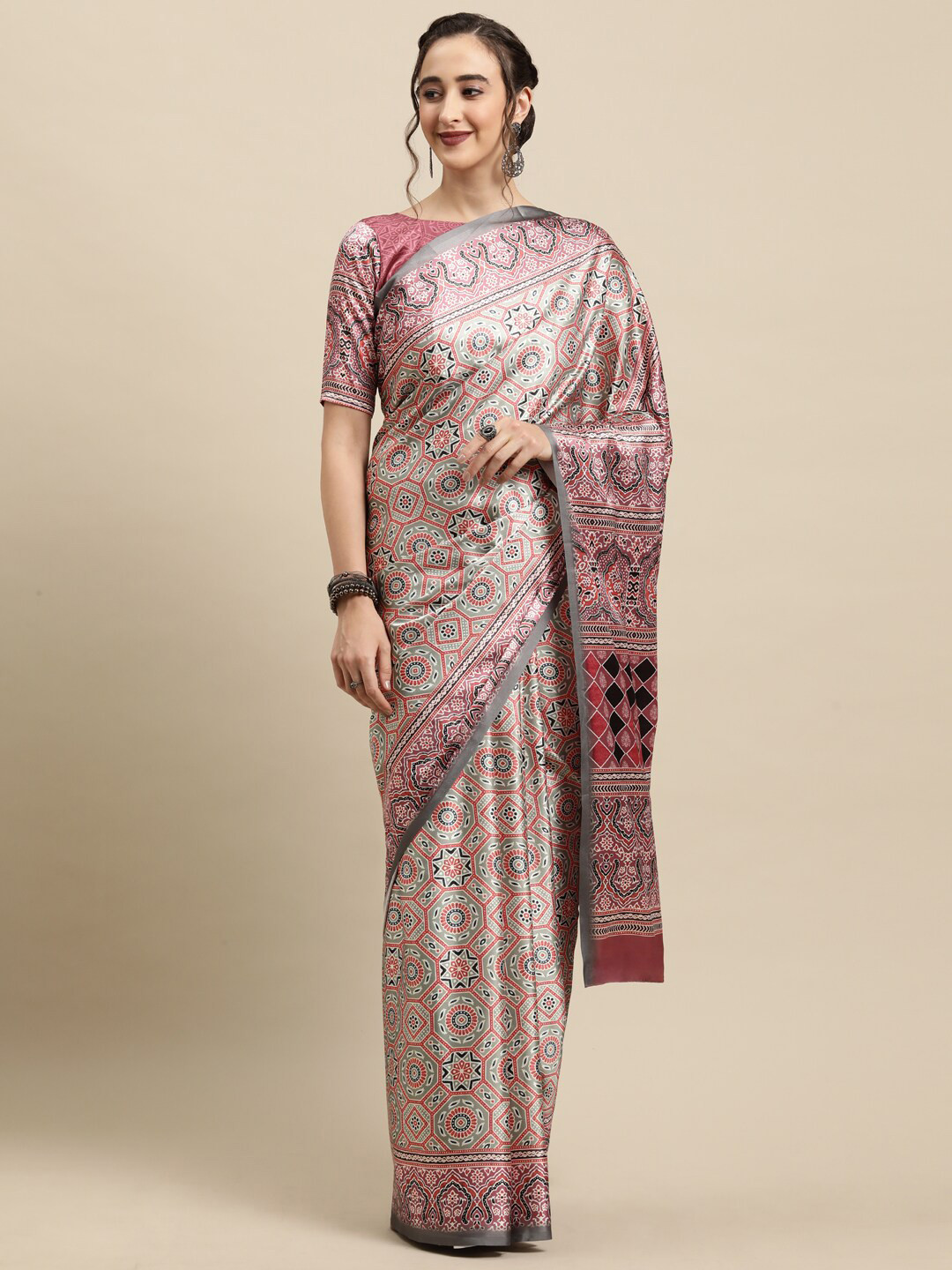 

Saree mall Pink & White Ethnic Motifs Sarees