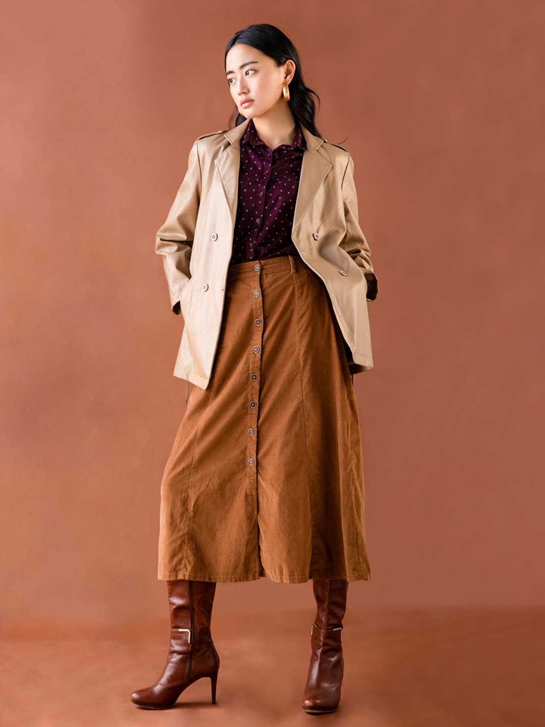 

Crimsoune Club Women Brown Solid Midi Length A-Line Skirt