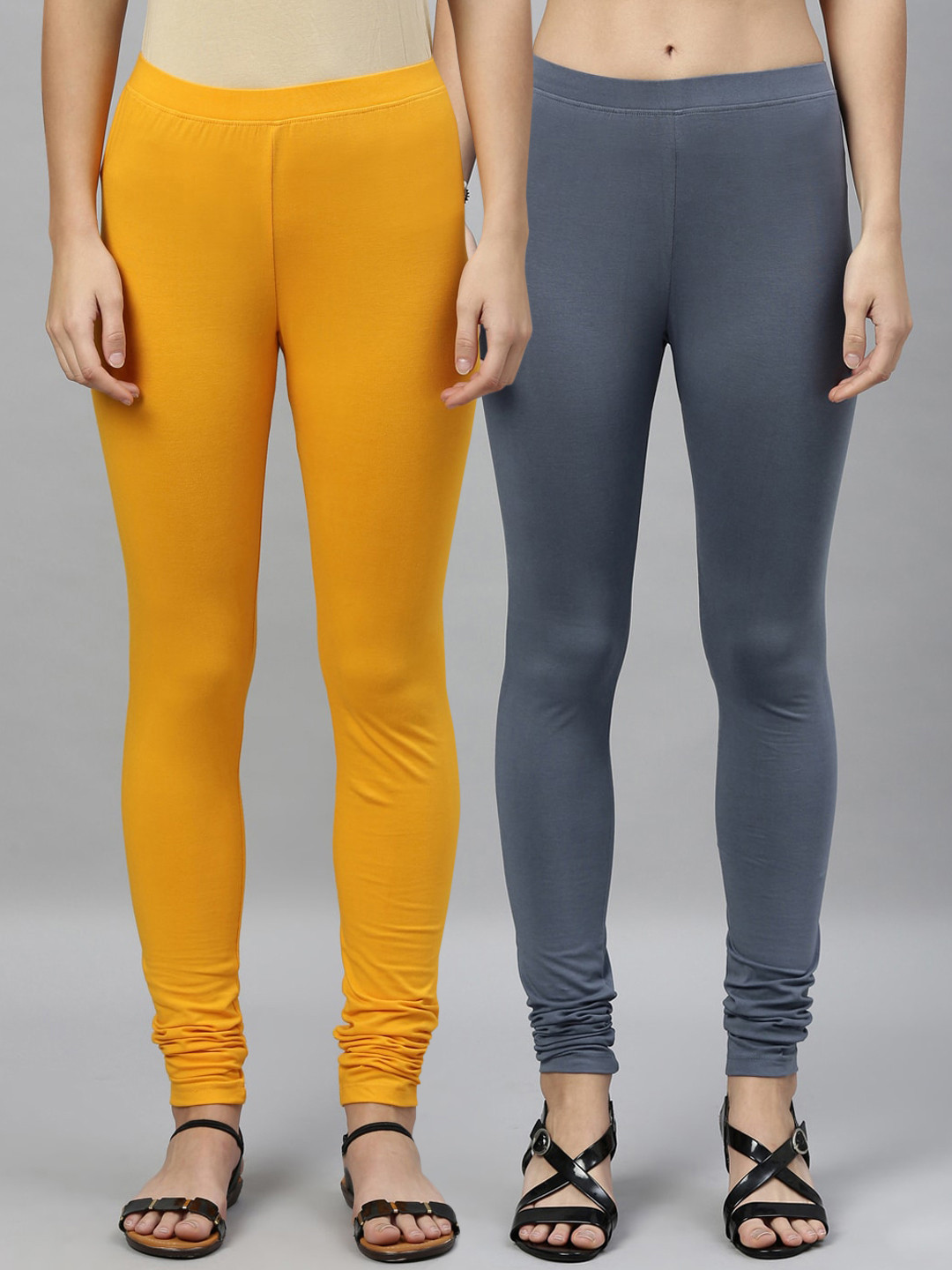 

Kryptic Women Pack of 2 Yellow & Grey Solid Churidar Length Leggings