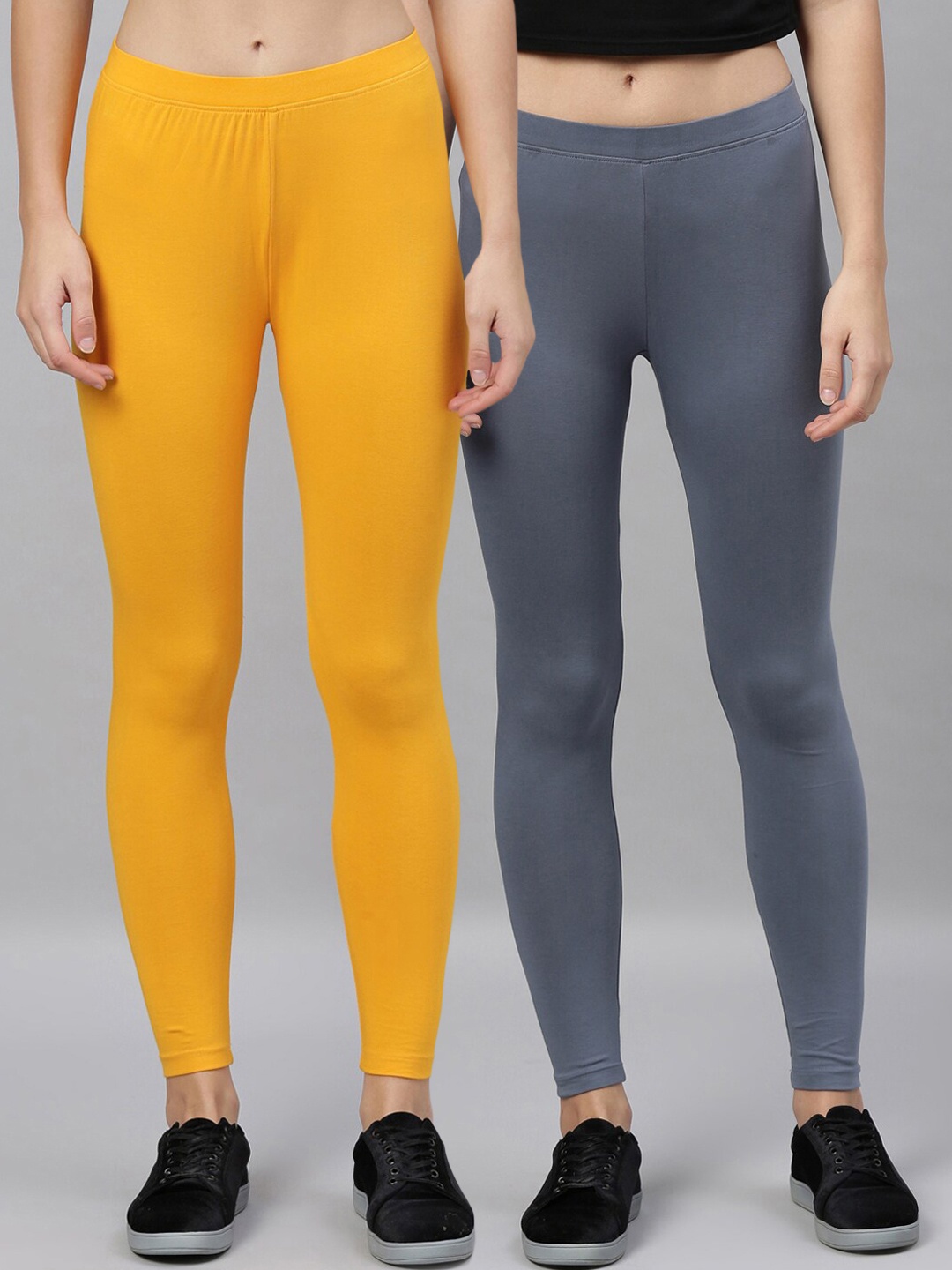 

Kryptic Women Pack Of 2 Solid Churidar Leggings, Yellow