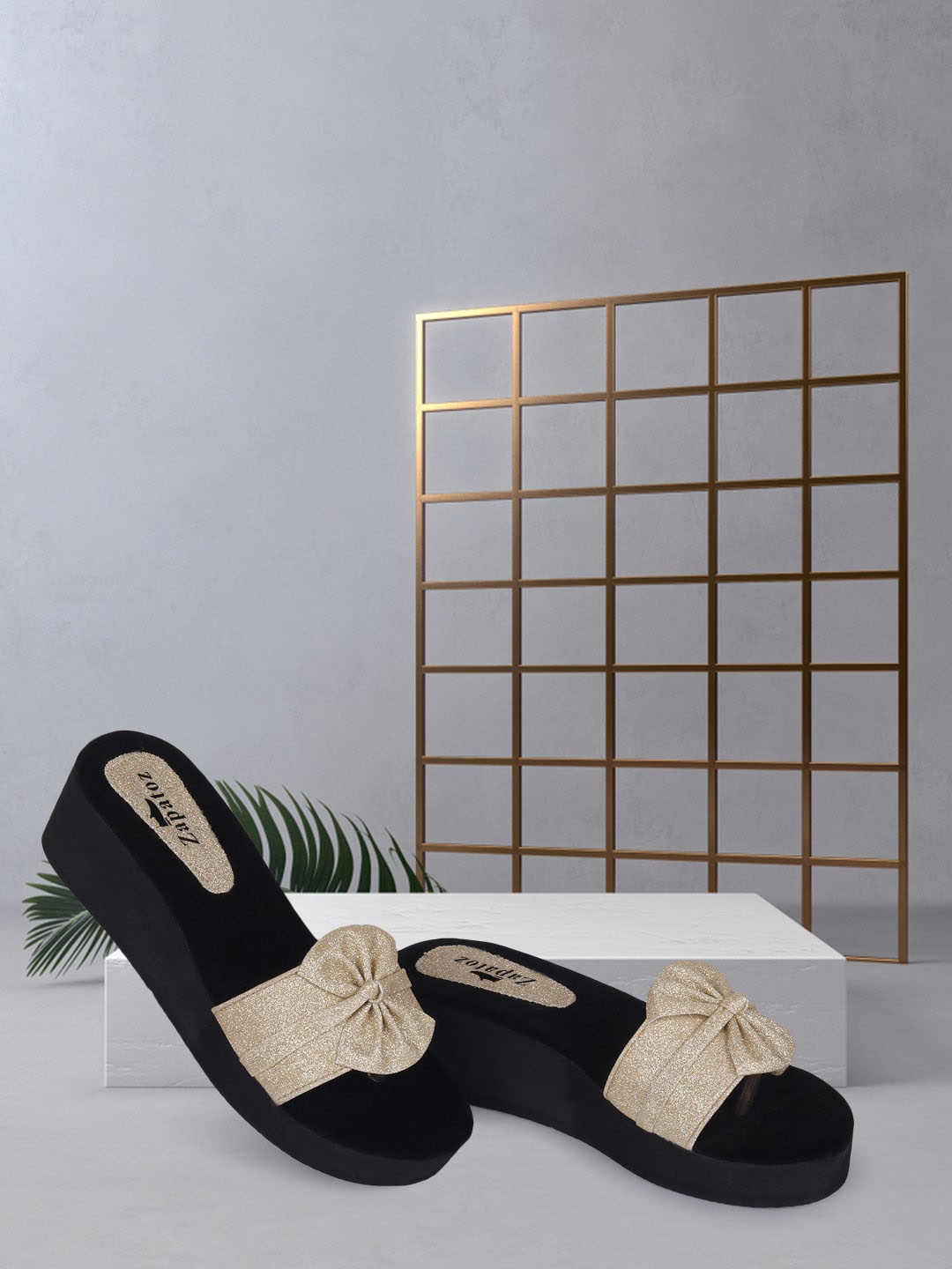 

ZAPATOZ Gold-Toned & Black Embellished PU Party Wedge Sandals with Bows
