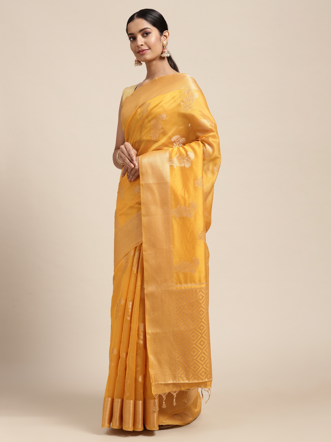 

Mitera Yellow Ethnic Motifs Organza Saree