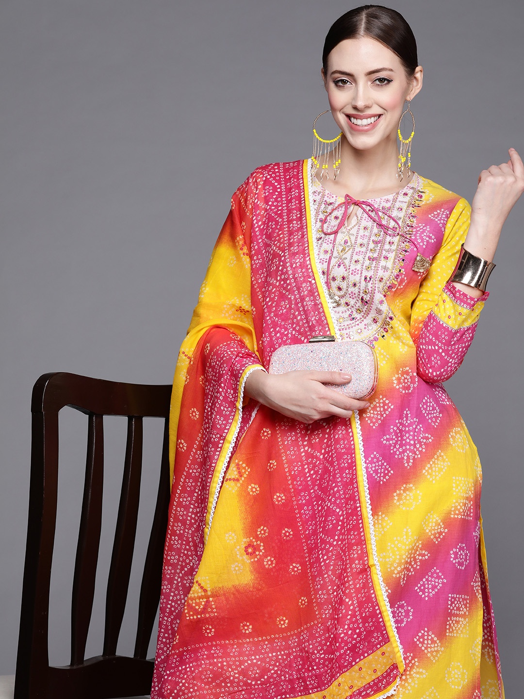 

Indo Era Women Yellow Bandhani Dyed Kurta with Trousers & With Dupatta