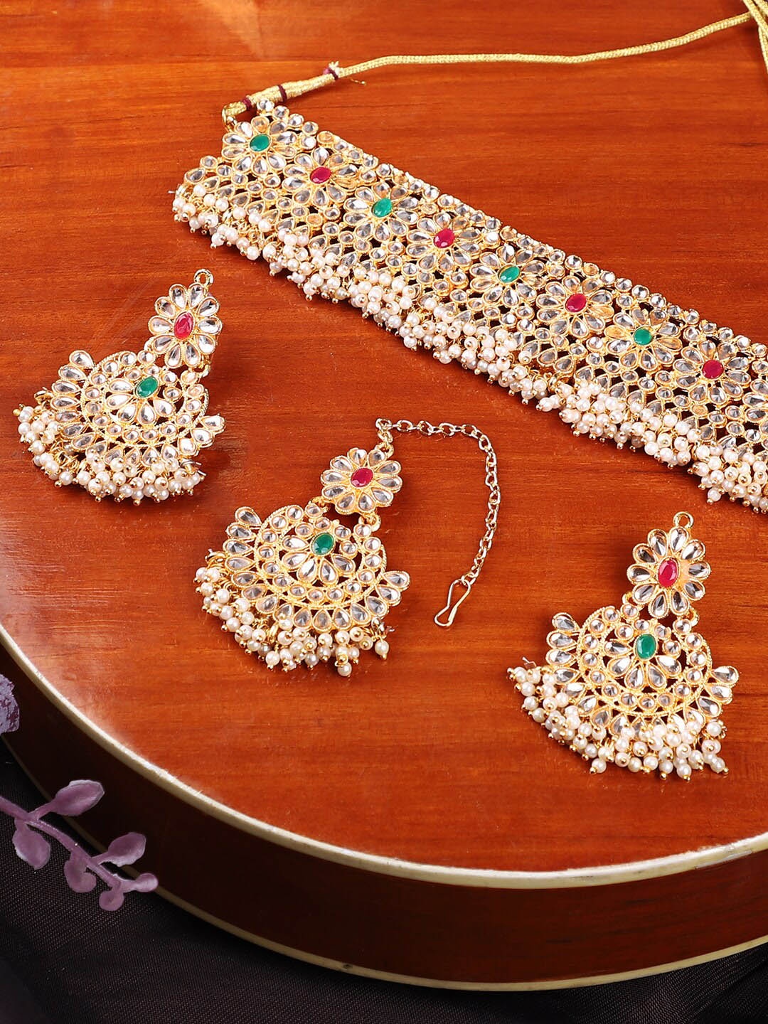 

ANIKAS CREATION Gold-Plated & White Stone-Studded & Beaded Traditional Jewellery Set