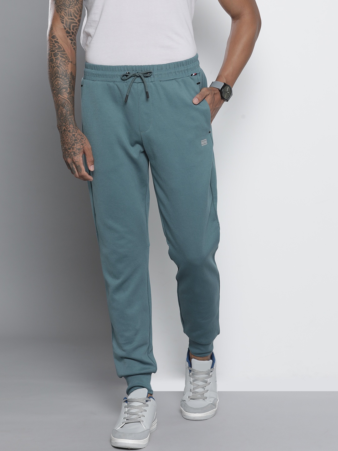 

Tommy Hilfiger Men Teal Blue Solid THPROTECT Joggers