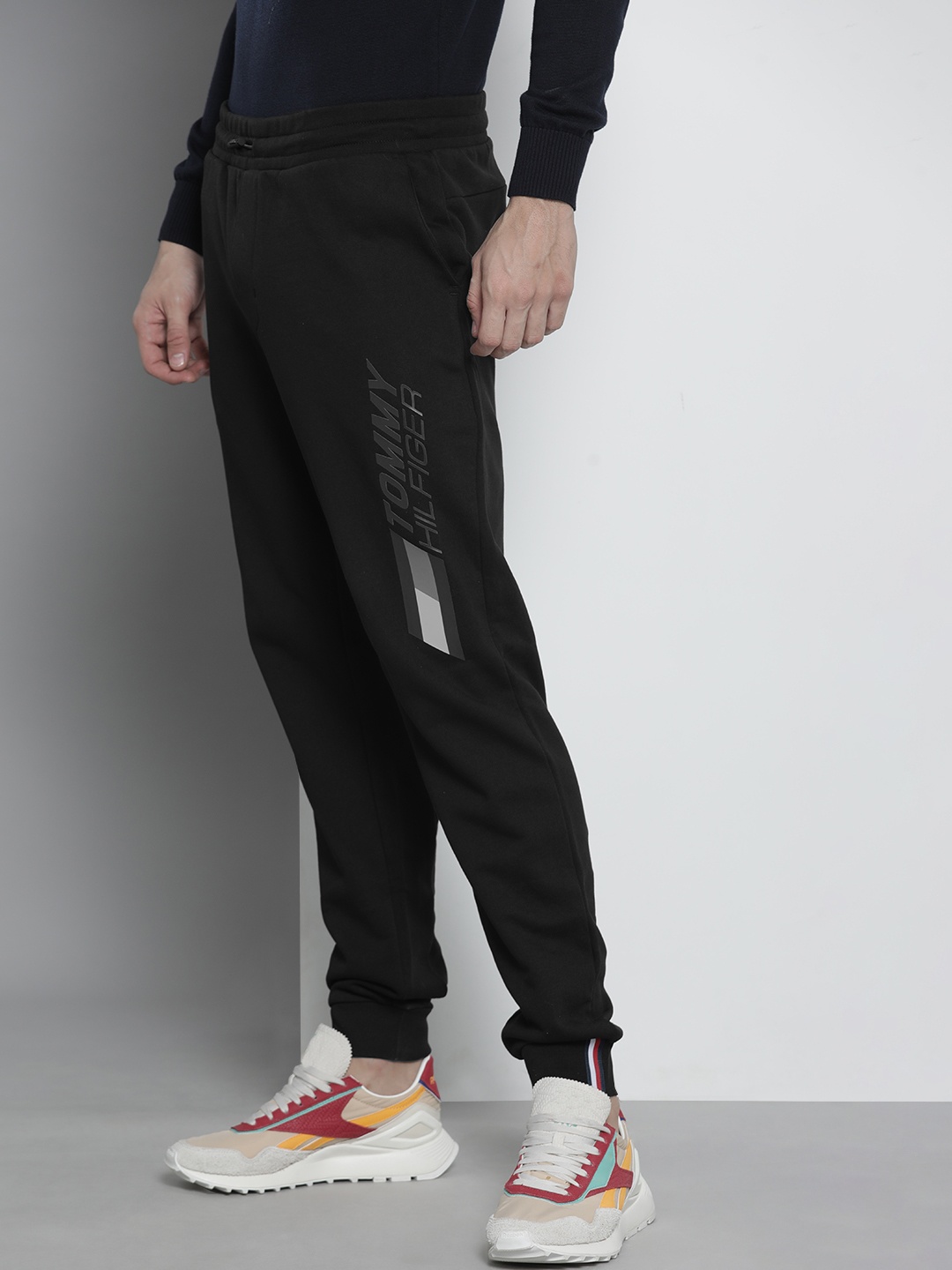 

Tommy Hilfiger Men Black Brand Logo Printed Regular Joggers