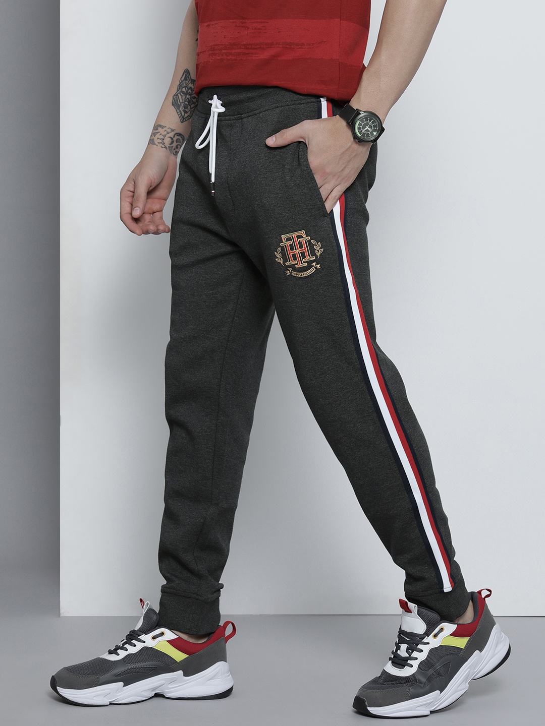 

Tommy Hilfiger Men Charcoal Brand Logo Embroidered Regular Joggers With Side Stripes