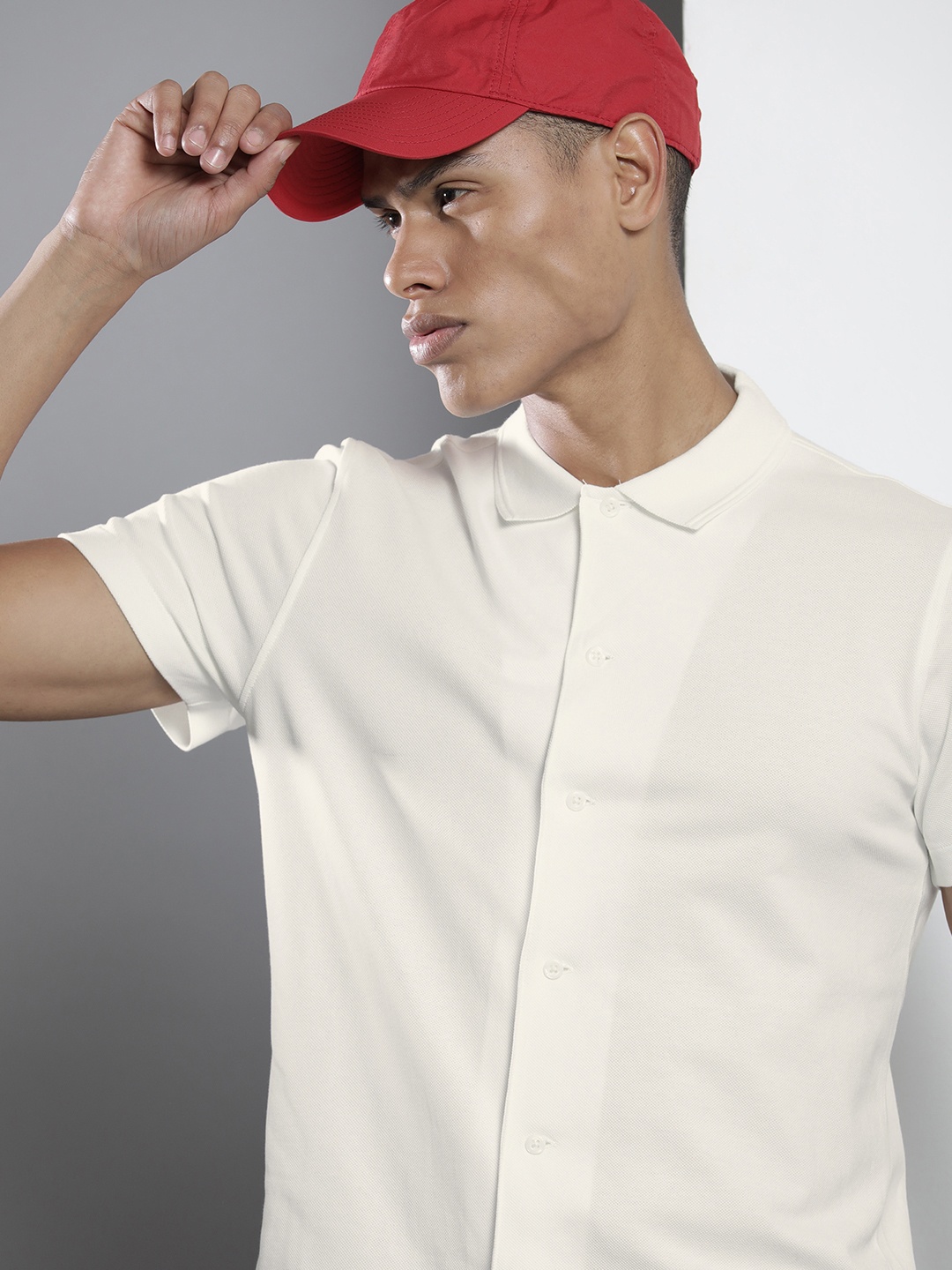

Tommy Hilfiger Men White Solid Knitted Casual Shirt