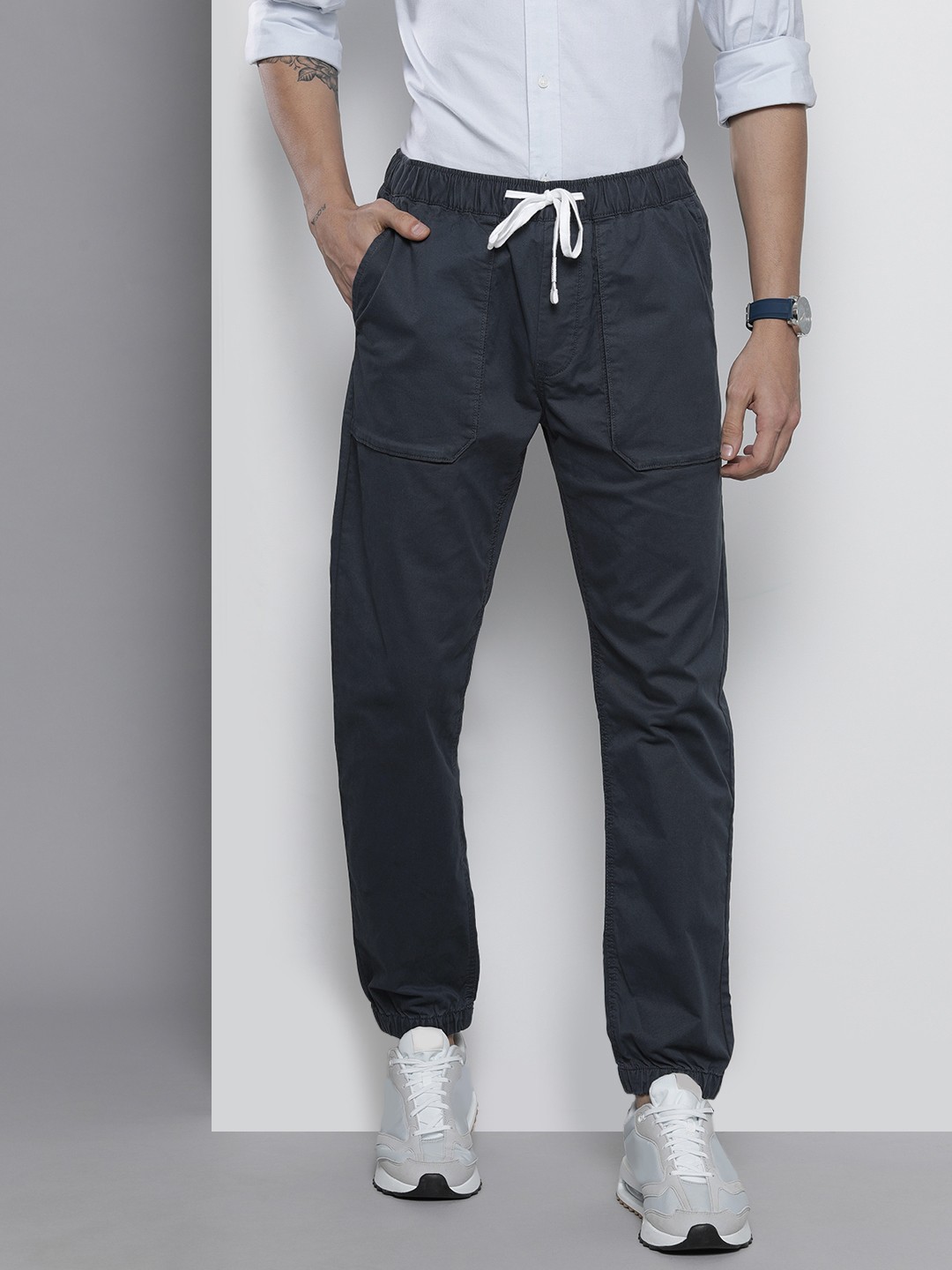 

Tommy Hilfiger Men Navy Blue Loose Fit Joggers Trousers