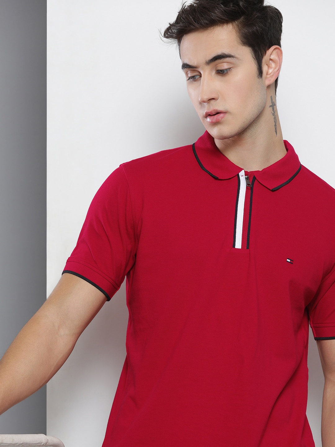 

Tommy Hilfiger Men Red Solid Polo Collar T-shirt