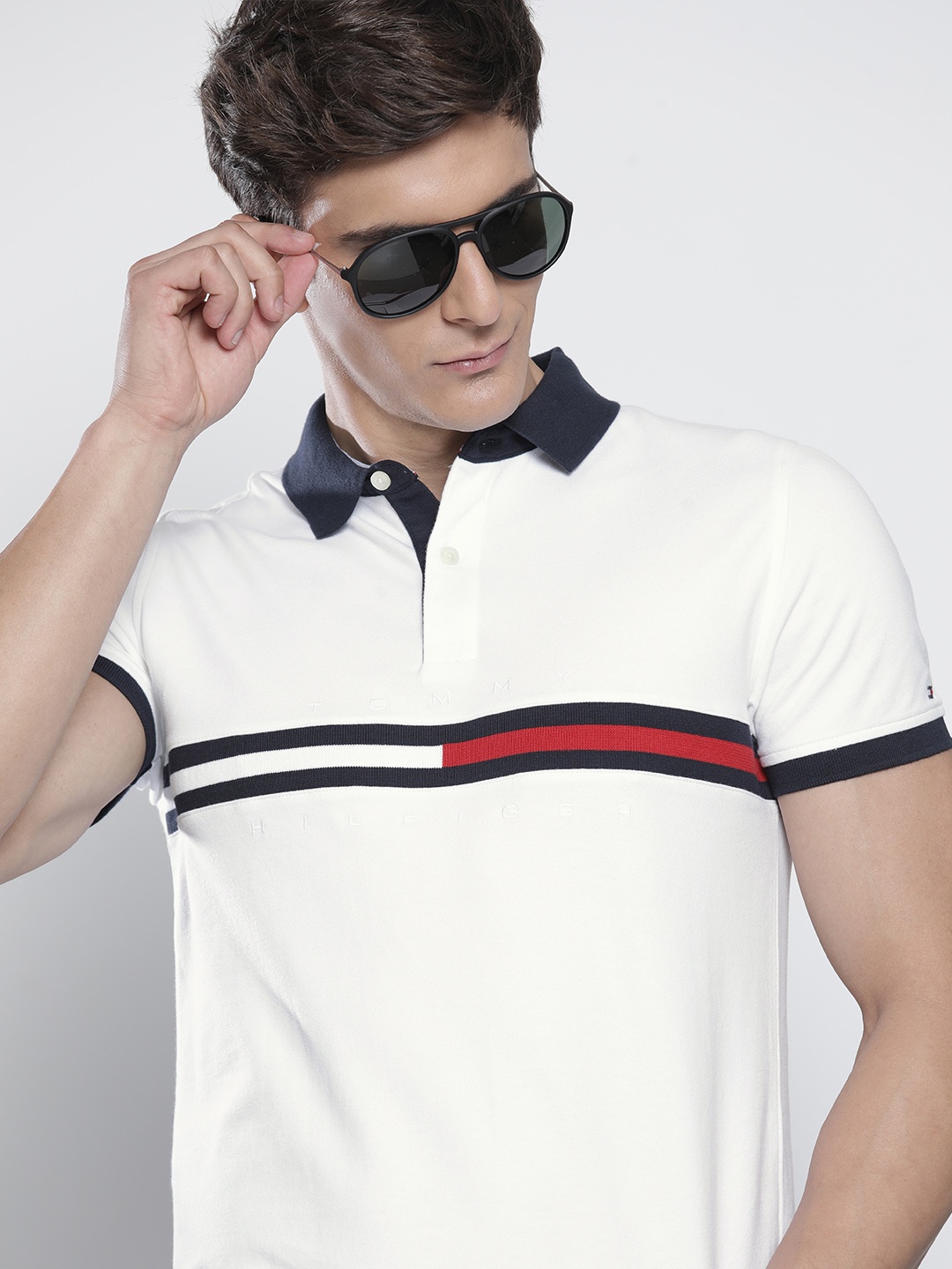 

Tommy Hilfiger Men White & Navy Blue Striped Polo Collar Slim Fit T-shirt