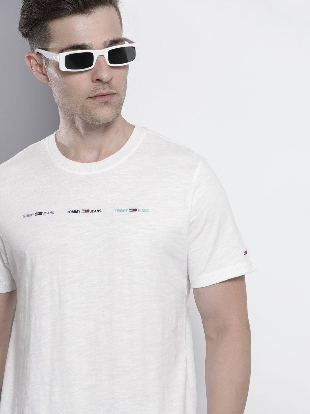 

Tommy Hilfiger Men White Solid Organic Cotton T-shirt with Logo