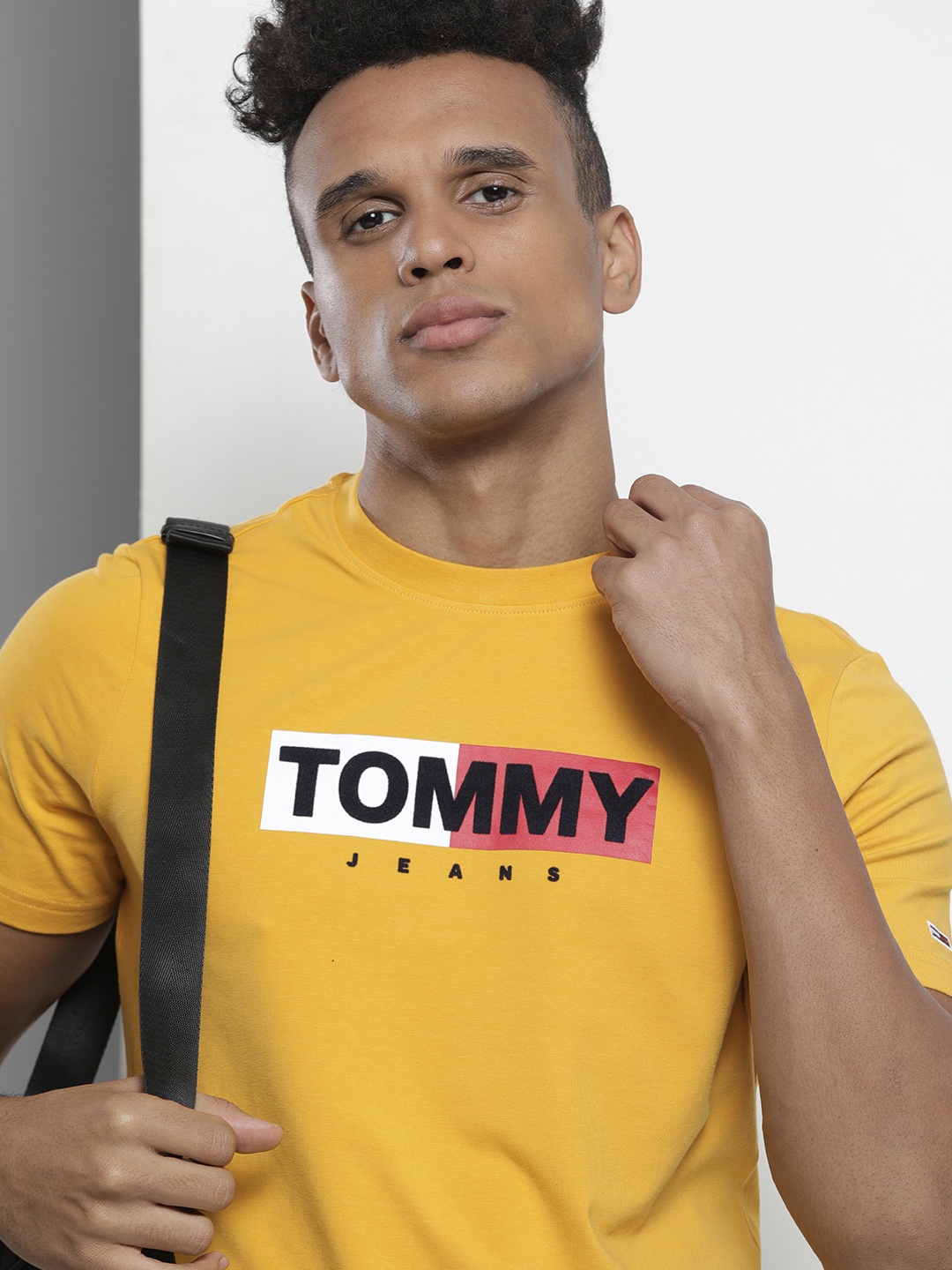 

Tommy Hilfiger Men Mustard Yellow Brand Logo Printed Slim Fit T-shirt