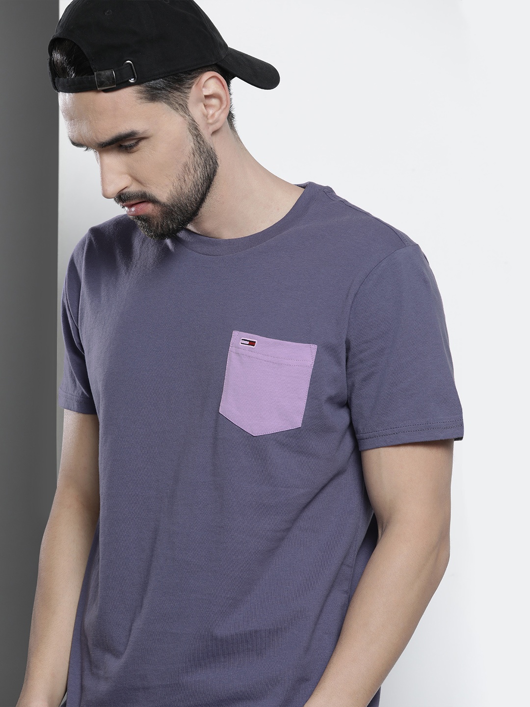 

Tommy Hilfiger Men Blue Solid Pure Cotton T-shirt With Chest Pocket