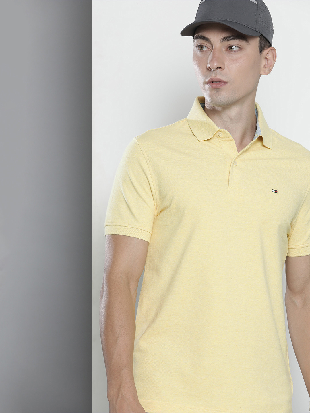 

Tommy Hilfiger Men Yellow Solid Polo Collar Slim Fit T-shirt