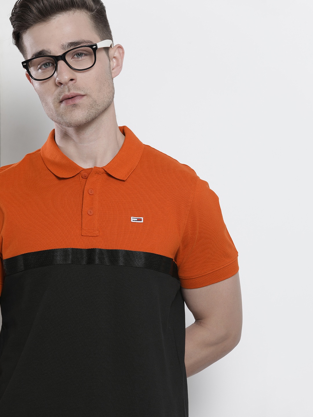 

Tommy Hilfiger Men Orange & Black Colourblocked Polo Collar Organic Cotton T-shirt