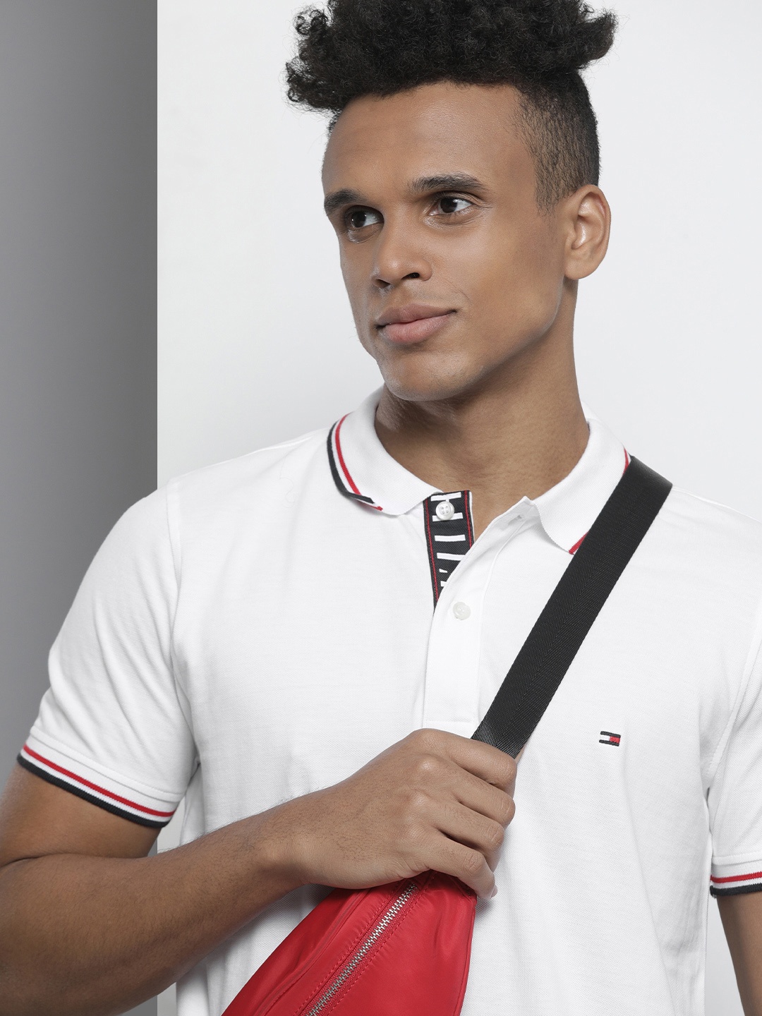

Tommy Hilfiger Men White Solid Polo Collar Pure Cotton Slim Fit T-shirt