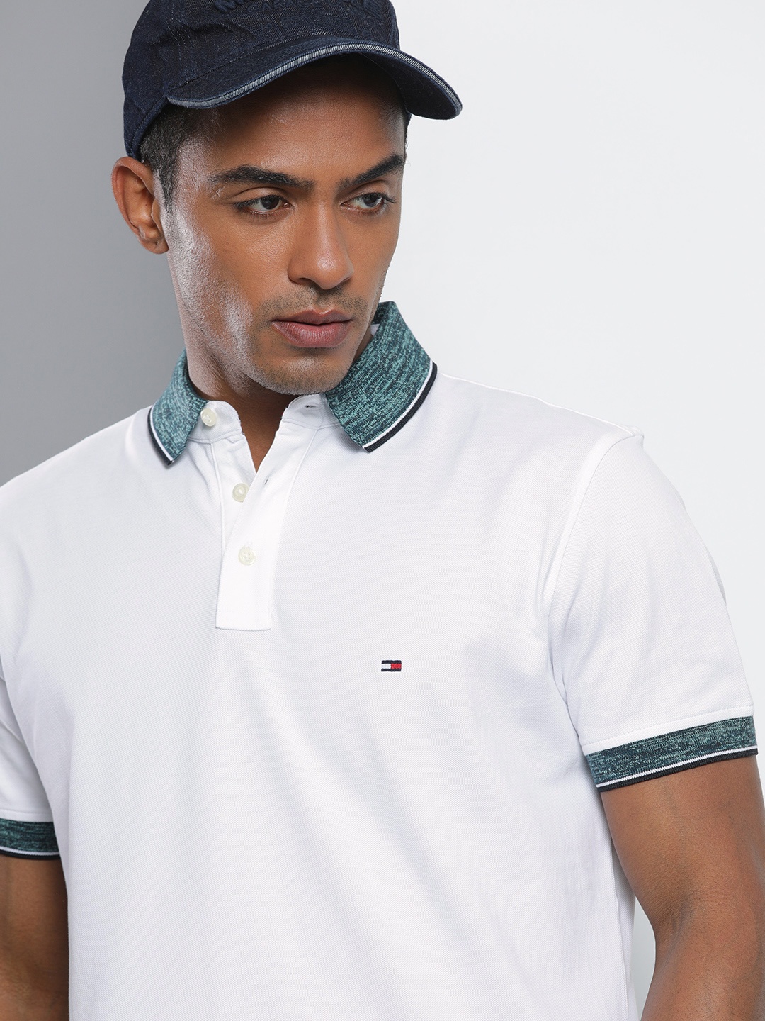 

Tommy Hilfiger Men White- Solid Polo Collar Casual T-shirt