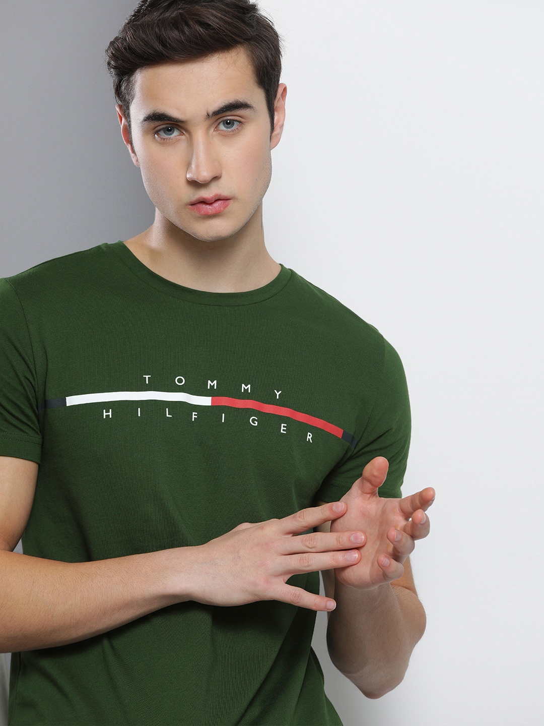 

Tommy Hilfiger Men Olive Green & White Printed T-shirt