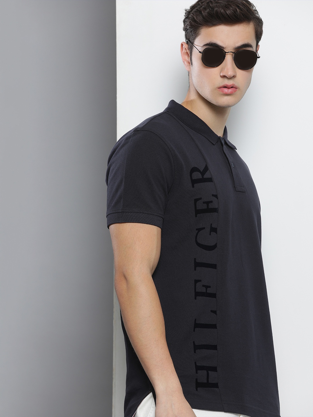 

Tommy Hilfiger Men Navy Blue Typography Printed Polo Collar Pure Cotton T-shirt