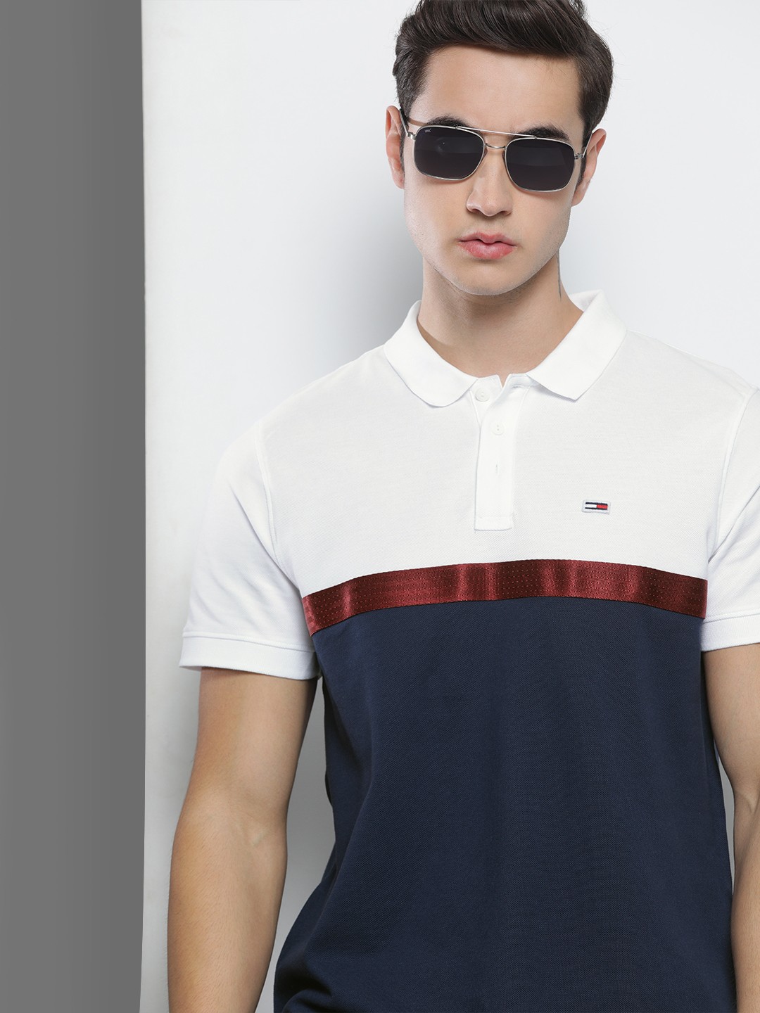 

Tommy Hilfiger Men White & Navy Blue Colourblocked Polo Collar T-shirt