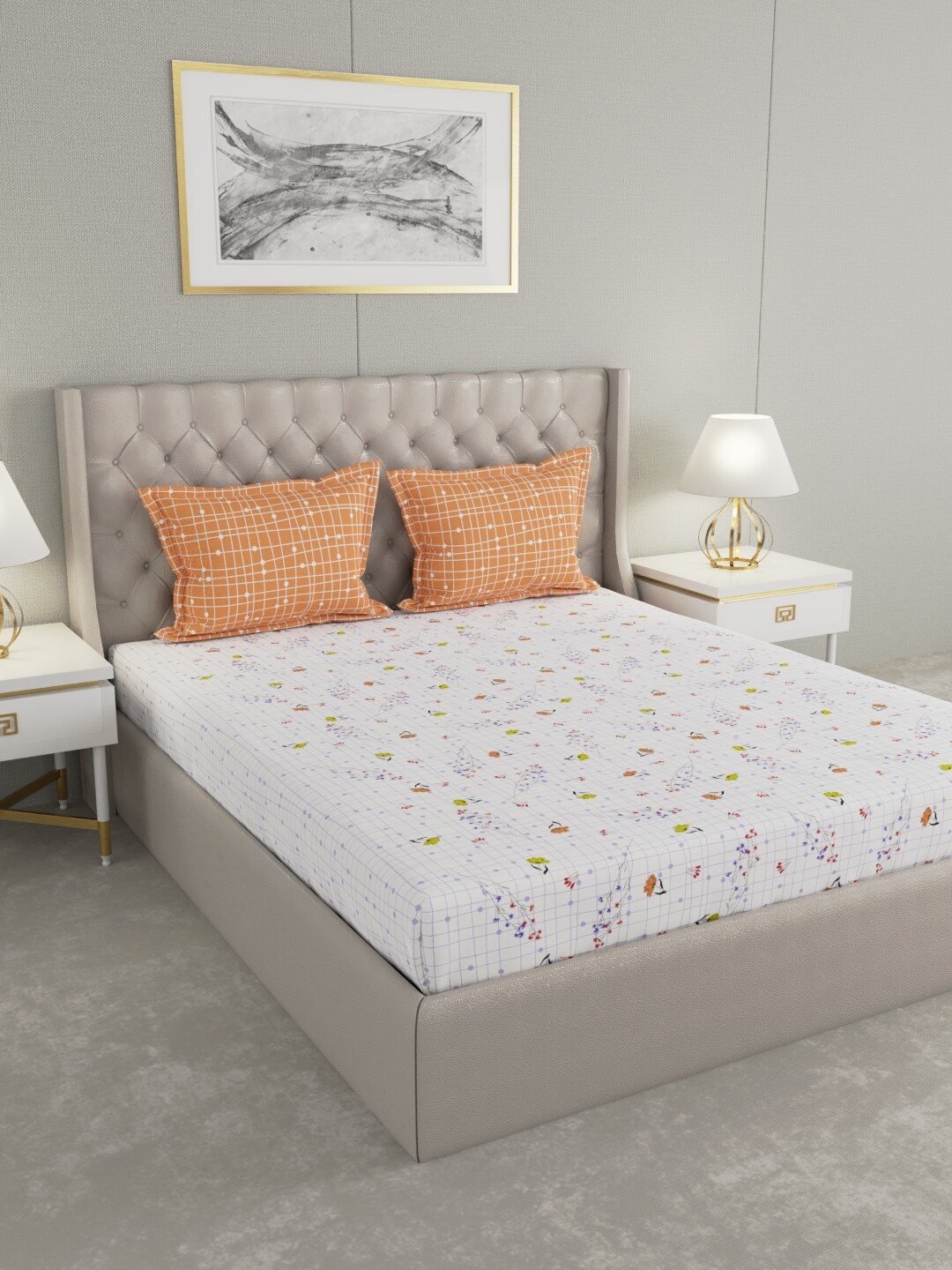 

Raymond Home White & Orange Floral Cotton 200 TC King Bedsheet with 2 Pillow Covers