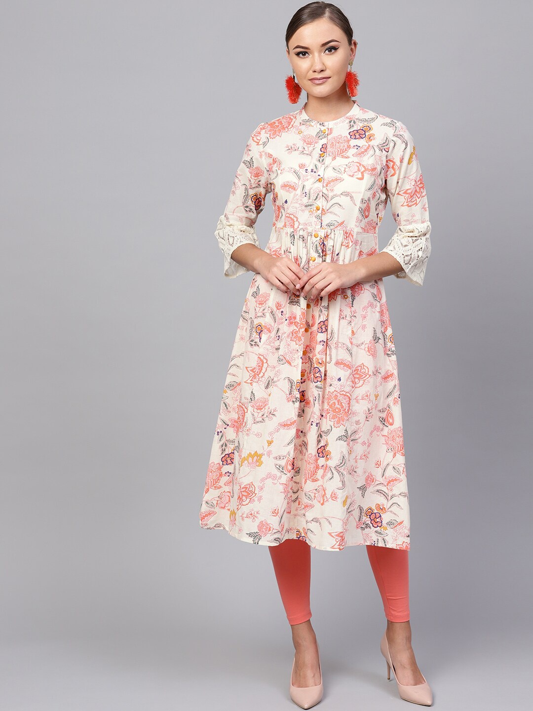 

Indo Era Women Off White & Peach-Coloured Floral Printed Kurta