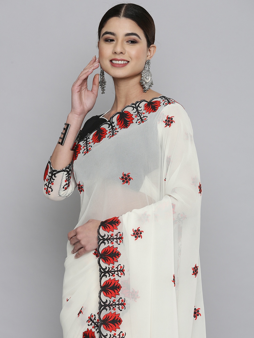 

HERE&NOW Off White Floral Embroidered Pure Georgette Saree