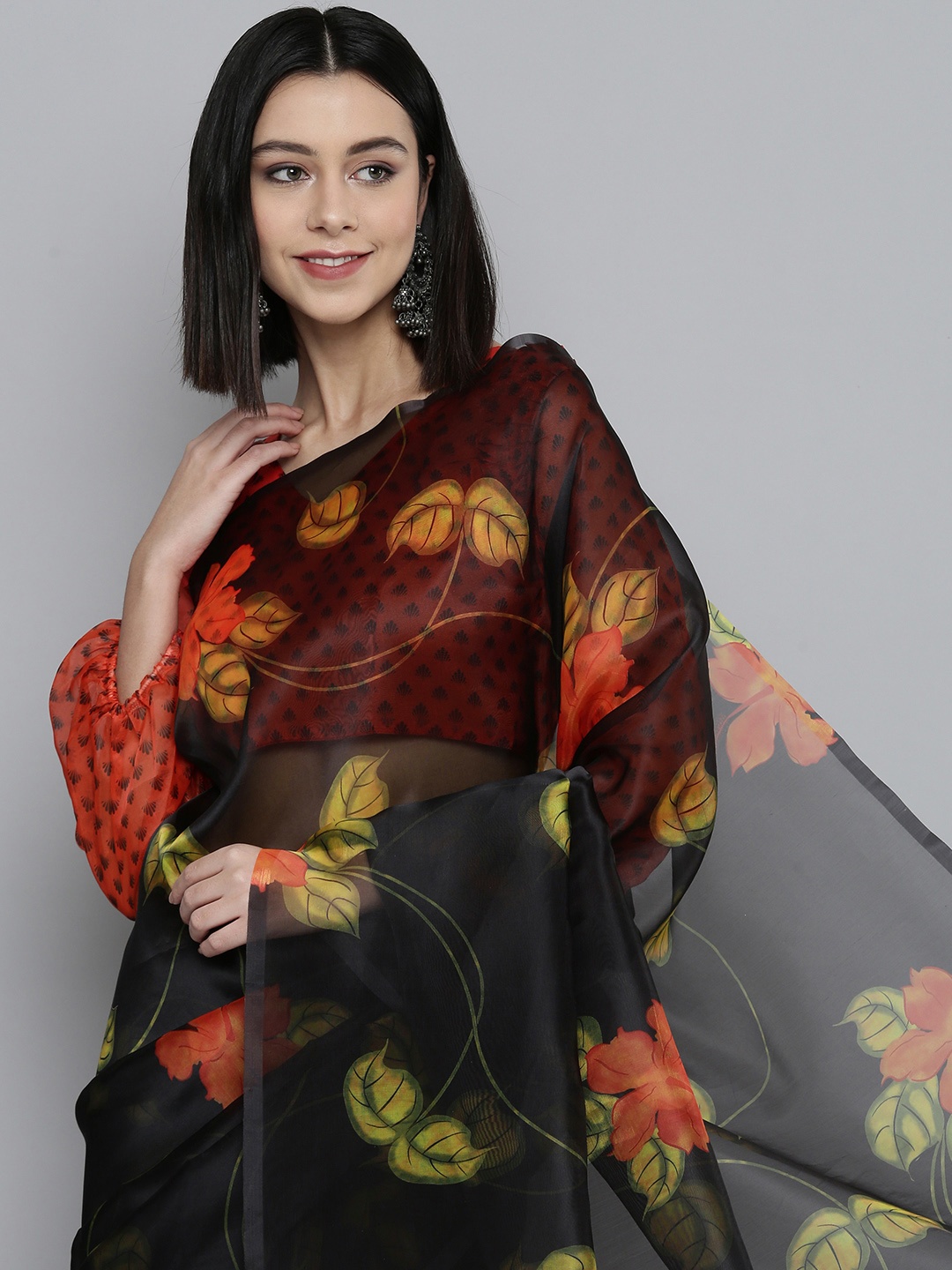 

HERE&NOW Black & Orange Floral Pure Georgette Saree