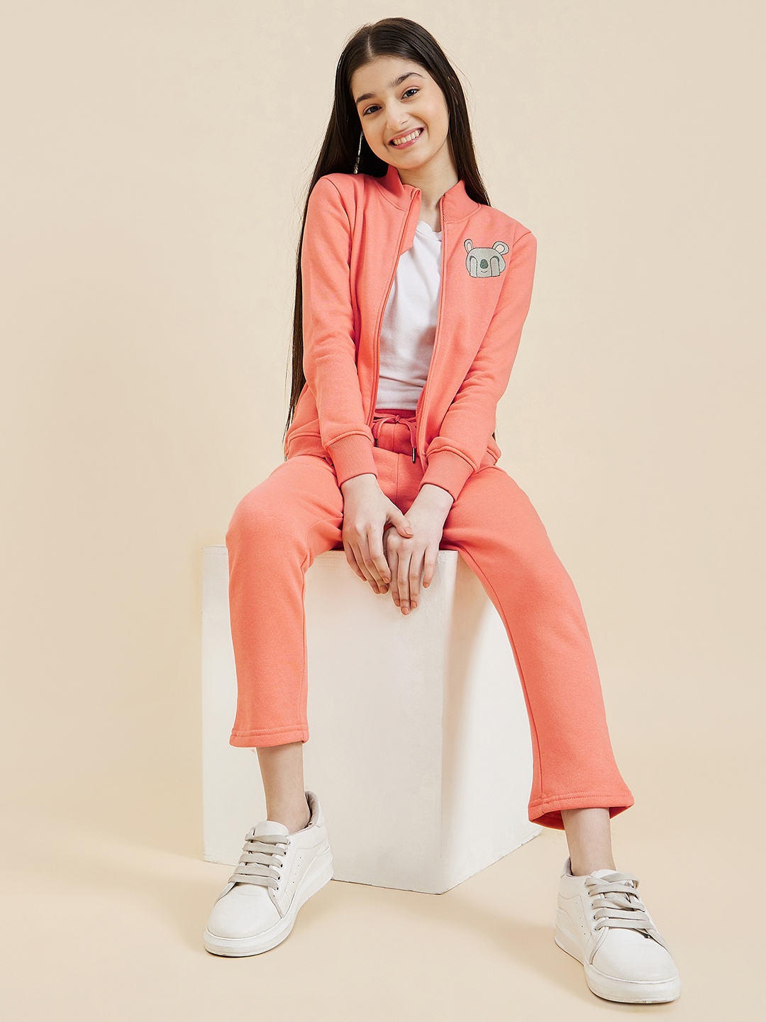 

Sweet Dreams Girls Peach-Coloured Solid Tracksuit, Pink